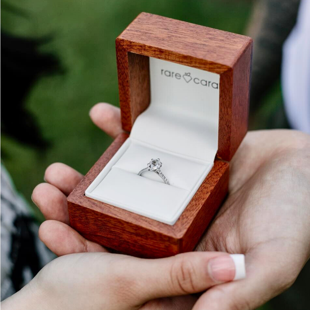 A diamond engagement ring in a Rare Carat ring box