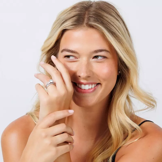 Woman with mix and match engagement ring and wedding band