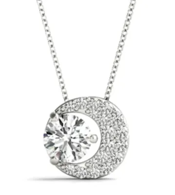 Image of a white gold moon and star diamond necklace