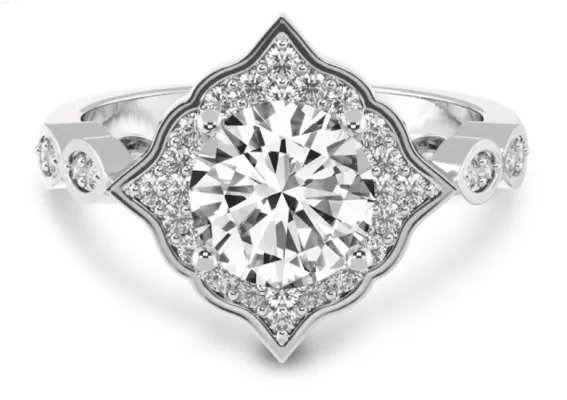 Image of vintage halo diamond setting in white metal with accent diamonds