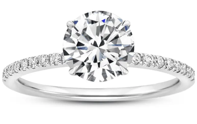 Round brilliant diamond with pave accented diamond band