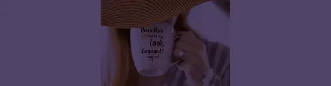 blog header woman drinking coffee out of cup that says does this ring make me look engaged? 