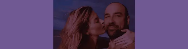 blog header with couple kissing on the cheek
