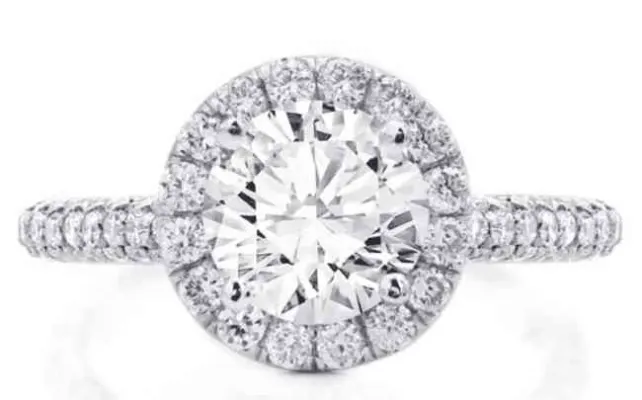 Round diamond in a halo ring by Rare Carat