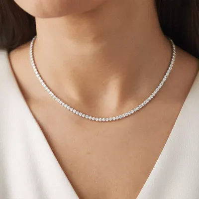 Composite image of different tennis necklace styles from Rare Carat, one of the best places to buy diamond tennis necklaces