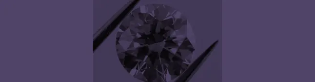blog header round brilliant diamond in tweezers