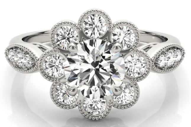Floral halo diamond ring set in white gold