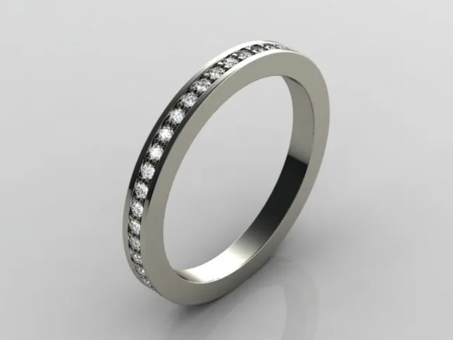 image of a white gold wedding band with small diamonds in it