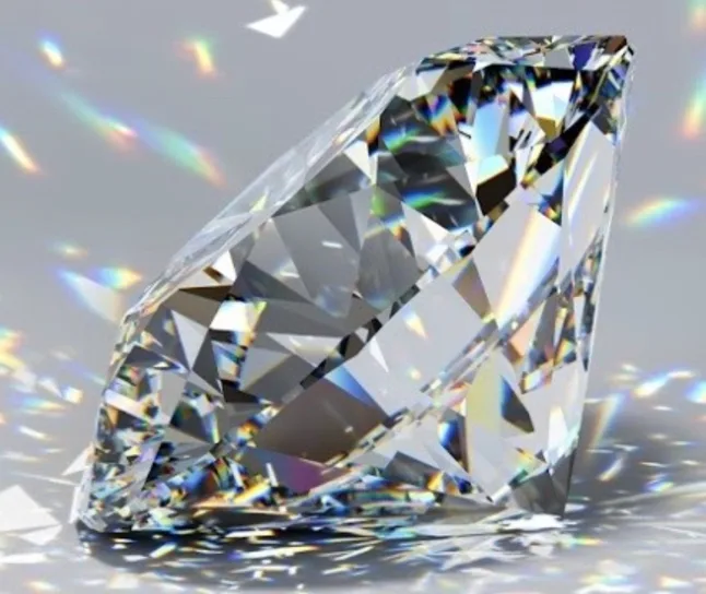 diamond with light refracting off of it showing fire and scintillation