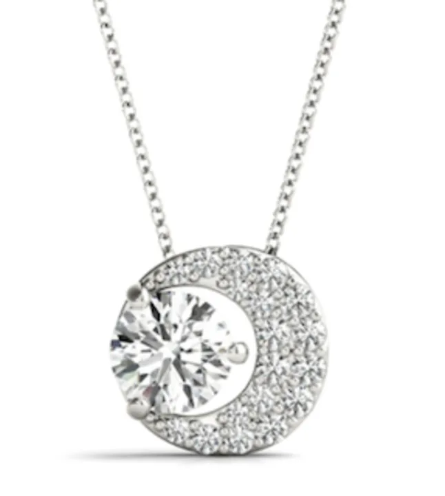Image of a white gold moon and star diamond necklace