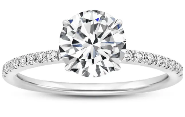 Round brilliant diamond with pave accented diamond band