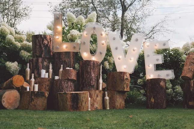 The word love spelled out in big letters with lights inside