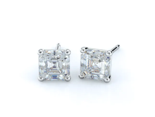 pair of Asscher cut diamond studs in white gold