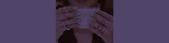 blog header woman with many engagement rings adorning her fingers