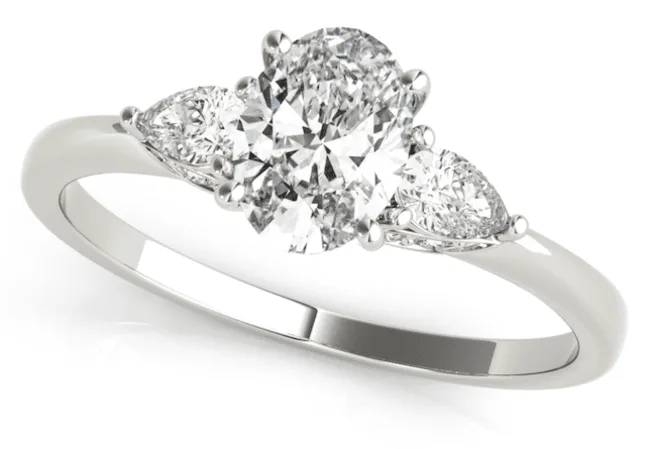 A three stone oval ring setting with pear shaped sides shown in white gold 