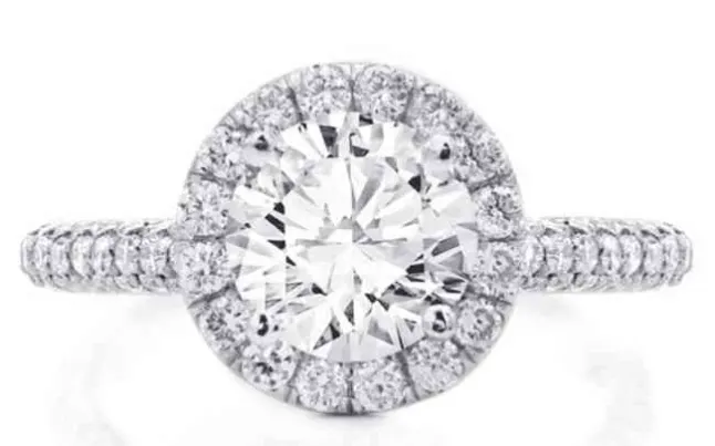 Round diamond in a halo ring by Rare Carat