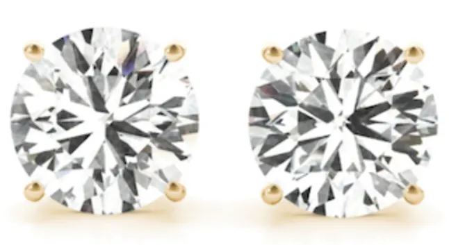 Diamond stud earrings set in gold are the perfect 