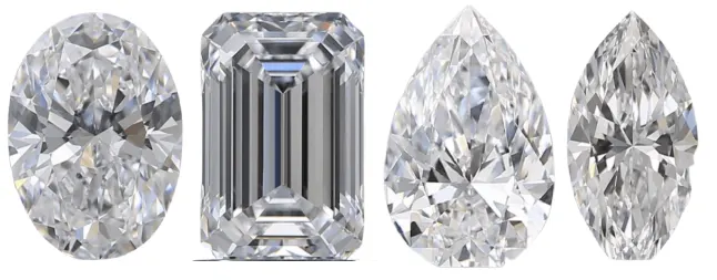 Oval, Emerald, Pear, and Marquise Cut diamonds in a row set against a white background