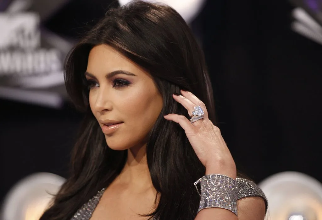 Kim Kardashian wearing diamond jewelry at a red carpet event