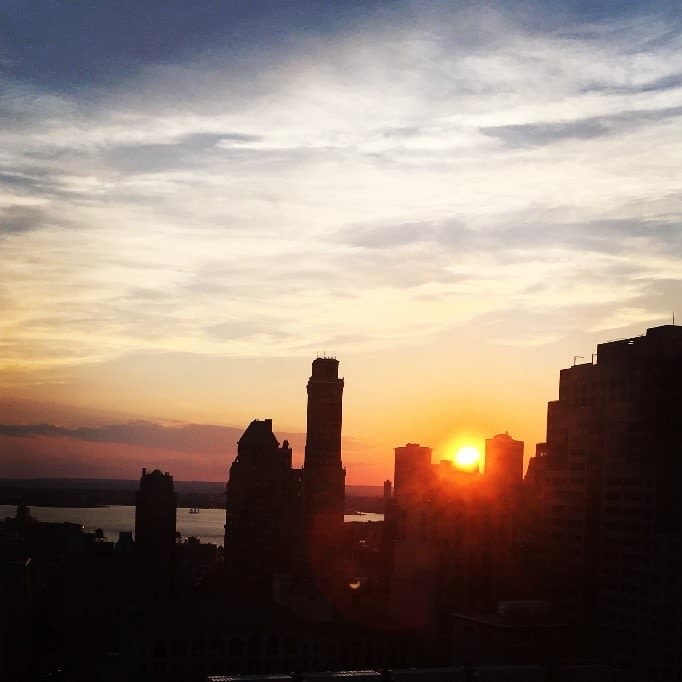 Sunset over a city skyline