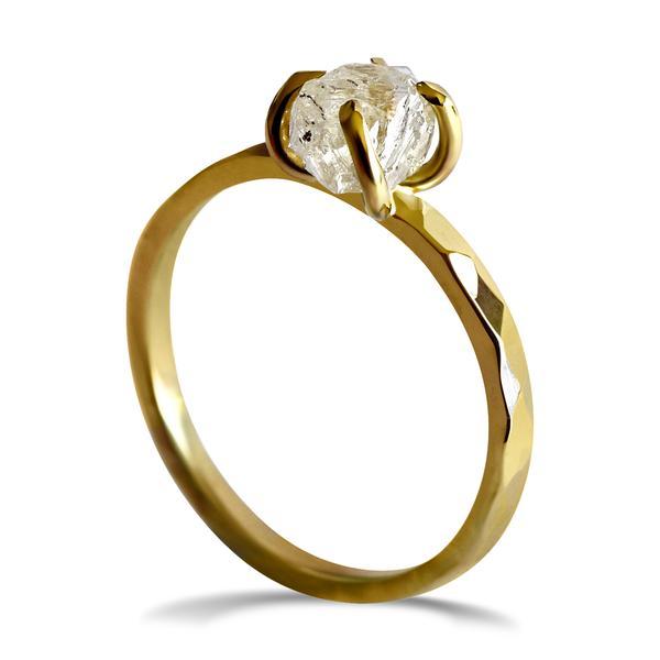 4 prong polki diamond ring in a gold setting
