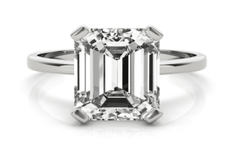solitaire emerald cut diamond ring in yellow gold setting