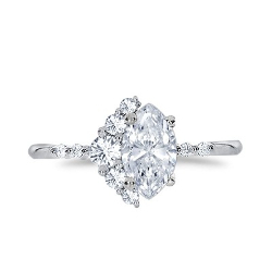 An asymmetrical halo ring setting where round diamonds form the partial halo and the accented band