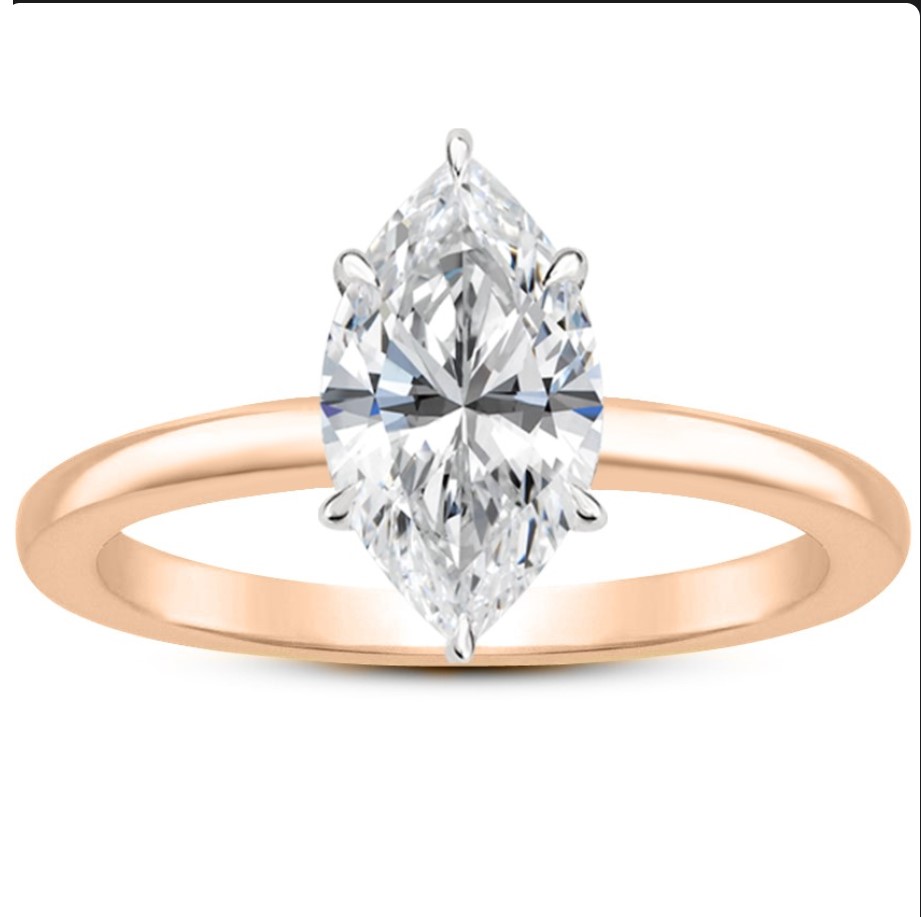A marquise cut solitaire diamond ring in rose gold setting