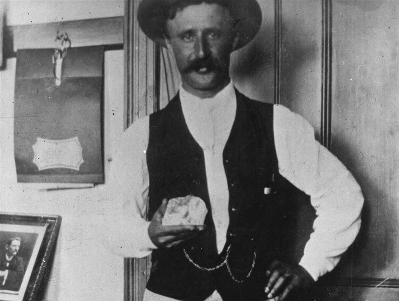 A vintage picture of a man holding the Cullinan Diamond