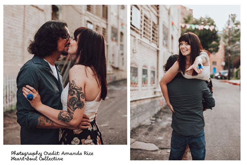 A couple posing for the camera to celebrate their recent engagement proposal