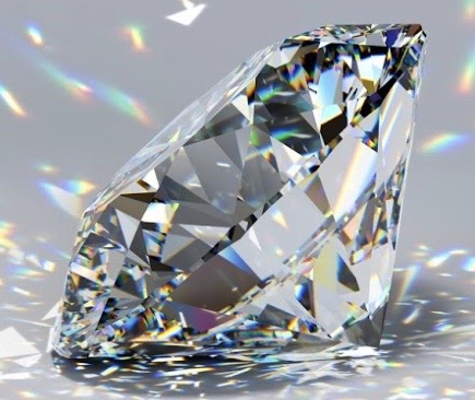 A close-up of a diamond highlighting its fire and scintillation