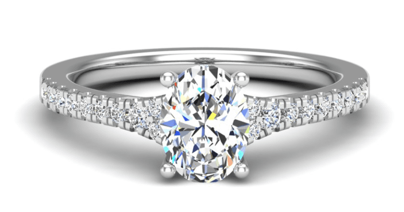 An oval diamond is a split shank with pave set in white gold