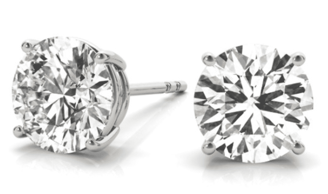 A pair of round cut diamond studs in 4 prong white gold setting