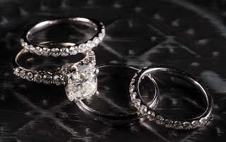 Two different bridal sets on a black background