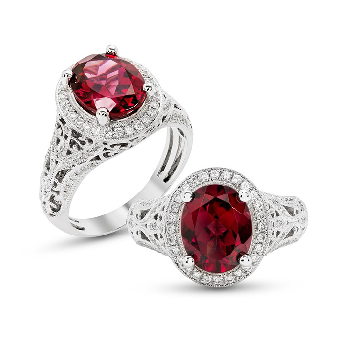 Two garnet and diamond rings in white gold setting