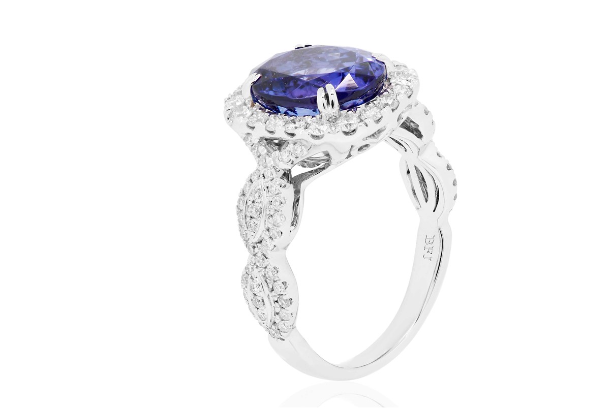 Side profile of a tanzanite and diamond ring in white gold setting