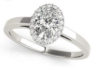 An oval cut diamond ring in halo setting