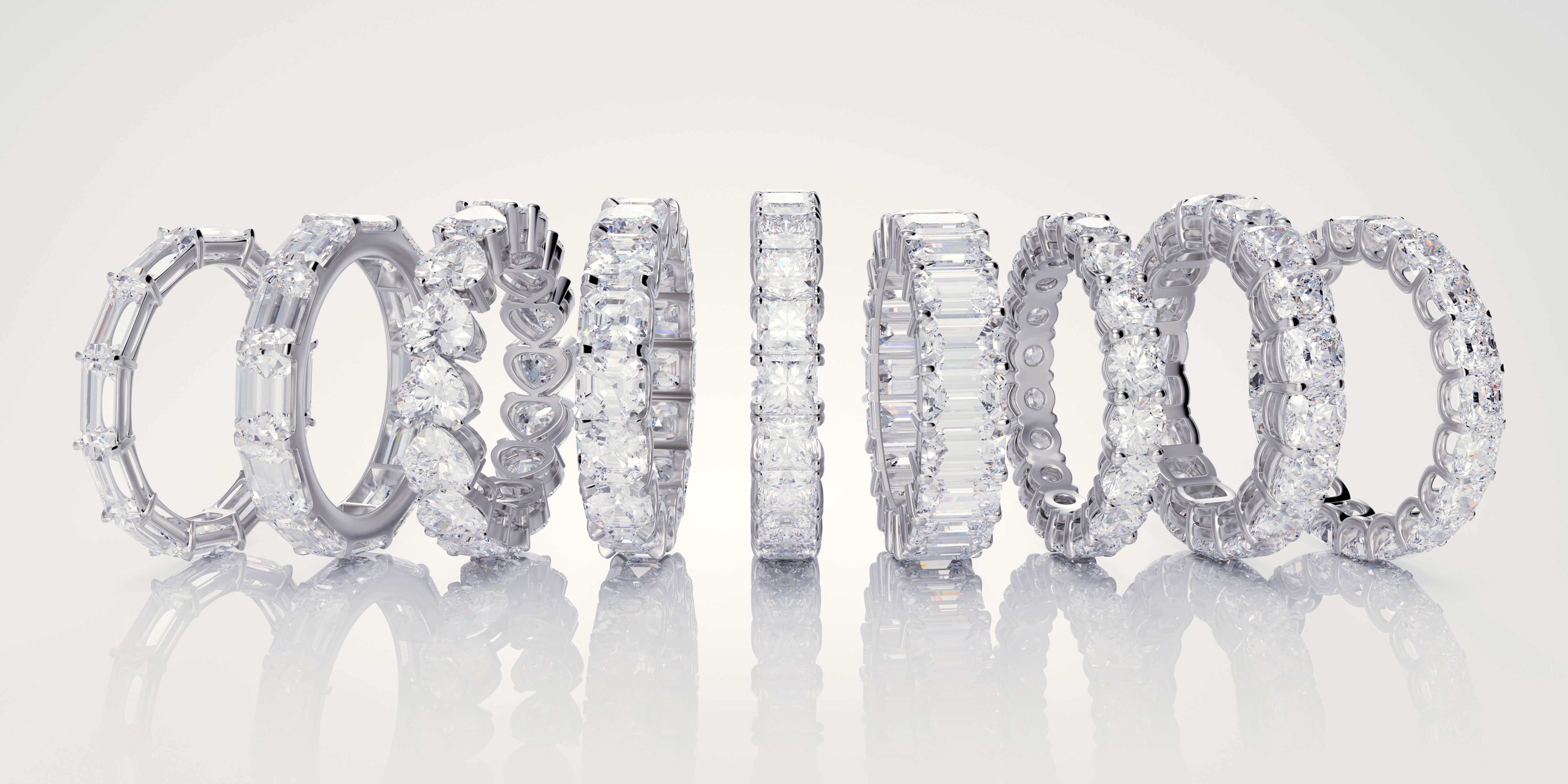 9 different shaped eternity rings in a row