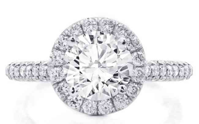 Round diamond in a halo ring by Rare Carat
